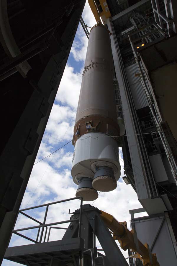 A crane lifts the GOES-S United Launch Alliance Atlas V first stage at the Vertical Integration Facility at Space Launch Complex 41 at Cape Canaveral Air Force Station in Florida.